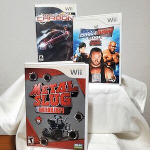 WII Games:  Metal Slug. Need for Speed Carbon. Smack Down vs Raw 2008.